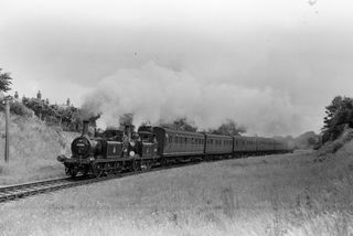 BR(S) Terrier class 32661 & BR(S) Terrier class 32677 between Havant and Langston, Hampshire with the 10.05am Sholing - Hayling Island service on Monday 07 Jun 1954 - J.J. Smith [043800]