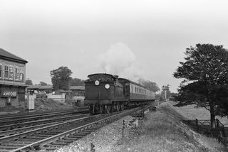 BR(S) H class 31319 at Ashford B Signal Box, Kent with the 4.06pm Ashford - Maidstone East service on Saturday 14 Aug 1954 - J.J. Smith [043974]