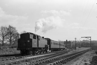 BR(M) 4P class 42081 at Kingscote, West Sussex with the 1.22pm Brighton - Oxted service on Saturday 16 Apr 1955 - J.J. Smith [044209]
