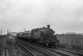 BR(M) 2MT class 41317 at Pevensey Bay, East Sussex with the 6.25pm Hastings - Eastbourne service on Thursday 02 Jun 1955 - J.J. Smith [044260]