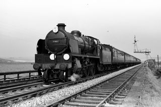 BR(S) U1 class 31907 at Newhaven A Signal Box, East Sussex with a Birmingham - Newhaven Special on Easter Sunday 21 Apr 1957 - J.J. Smith [044333]