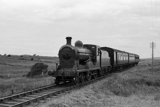 201 between Ballyshannon and Bundoran, Ireland with a down Bundoran Express service on Sunday 30 Jun 1957 - J.J. Smith [044483]