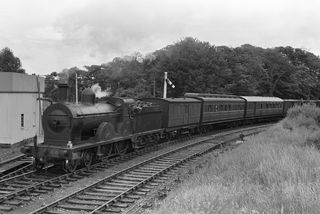 44 at Bundoran Junction, Ireland with the 10.45am Dundalk Junction - Bundoran service leaving on Monday 01 Jul 1957 - J.J. Smith [044496]