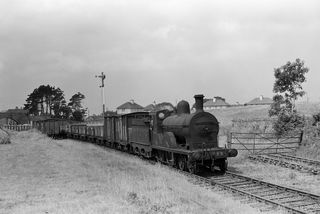 73 at Ballyshannon, Ireland with the 11.20am Bundoran - Enniskillen Freight leaving on Thursday 04 Jul 1957 - J.J. Smith [044519]