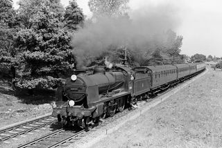 BR(S) U class 31804 in Hampshire with the 12.33pm Portsmouth on Saturday 27 Jul 1957 - J.J. Smith [044542]