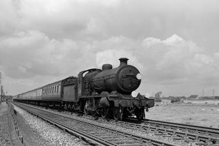 BR(S) K class 32338 in West Sussex with the 7.28am Wolverhampton (direct) - Eastbourne and Hastings service on Saturday 02 Aug 1958 - J.J. Smith [044942]
