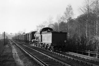BR(S) K class 32340 east of Kingswood, Surrey with the 1.03pm Tattenham Corner - New Cross Gate service on Sunday 14 Dec 1958 - J.J. Smith [045078]