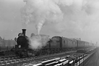 BR(S) 0395 class 30567 at Pouparts Junction, Greater London with the "The Portsmouth Direct Line Centenarian" Rail Tour. 10.12am Victoria - Gosport on Sunday 25 Jan 1959 - J.J. Smith [045096]