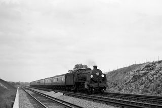 BR(S) N class 31824 west of Newington, Kent with the 9.57am Lewisham - Ramsgate via Bexleyheath service on Monday 18 May 1959 - J.J. Smith [045340]
