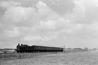 BR(S) C class 31584 at Allhallows, Kent with the 12.40pm Allhallows - Gravesend service leaving on Bank Holiday Monday 03 Aug 1959 - J.J. Smith [045555]