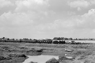 BR(S) C class 31717 at Middle Stoke Halt, Kent with the 1.54pm Gravesend - Allhallows service on Bank Holiday Monday 03 Aug 1959 - J.J. Smith [045560]