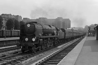 BR(S) West Country class 34100 'Appledore' at Kensington Olympia Station, Greater London with the 11.24am Hastings - Leicester service on Saturday 12 Aug 1961 - J.J. Smith [045928]