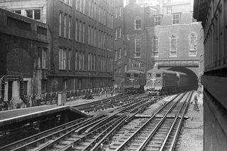 LT Class MET Bo-Bo 7 'Edmund Burke' & LT Class MET Bo-Bo 11 'George Romney' at Liverpool Street, Greater London with a MET 7 on 8.11am from Chesham on Saturday 09 Sep 1961 - J.J. Smith [045977]