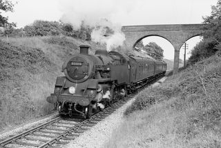 BR Std 4MT class 80019 in East Sussex with the 3.40pm Eastbourne - Tunbridge Wells West service on Friday 04 Jun 1965 - J.J. Smith [047037]