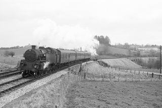 BR Std 4MT class 80041 near Cole, Somerset with the 2.00pm Templecombe - Bath Green Park service on Friday 04 Mar 1966 - J.J. Smith [047269]