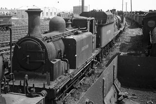 BR(S) S11 class 30396 & BR(S) D15 class 30469 at Eastleigh Shed, Hampshire on Saturday 14 May 1949 - J.J. Smith [047660]