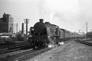 BR(S) U1 class 31909 at Lewes, East Sussex with the 6.14pm Newhaven Harbour - Victoria service on Monday 25 Jul 1949 - J.J. Smith [047795]