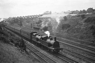 BR(S) R1 class 31107 & BR(S) R1 class 31147 between Folkestone Junction and Harbour, Kent with the 2.55pm from Folkestone Harbour on Thursday 04 Aug 1949 - J.J. Smith [047822]