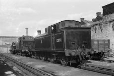 BR(S) I3 class 32091 & BR(S) E5 class 32587 at Brighton Shed, East Sussex on Sunday 05 Oct 1952 - J.J. Smith [047875]