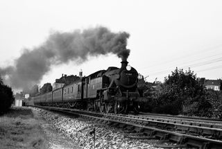 BR(M) 4P class 42104 near Upper Warlingham, Greater London with a service to Oxted and Brighton circa 1953 - C. Hogg [048014]