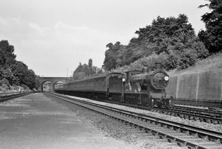 BR(S) T9 class 30289 at Surbiton, Greater London with the 3.14pm Waterloo to Basingstoke empties on Saturday 19 Jun 1954 - C. Hogg [048159]