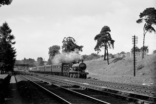 BR(S) T9 class 30729 near Farnborough, Hampshire with the 10.35am Lymington Pier - Waterloo service on Saturday 11 Sep 1954 - C. Hogg [048207]