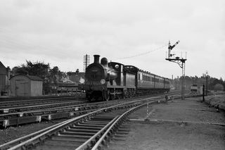 BR(S) C class 31681 at Reigate, Surrey with the 10.16am Redhill - Reading South service on Friday 22 Oct 1954 - C. Hogg [048239]