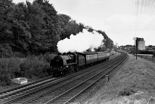 BR(S) U class 31621 at Andover Junction, Hampshire with the 10.10am Southampton Terminus - Cheltenham service on Saturday 14 May 1955 - C. Hogg [048306]