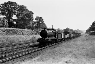 BR(S) K class 32339 near Three Bridges, West Sussex with an up local freight service on Monday 25 Jul 1955 - C. Hogg [048324]