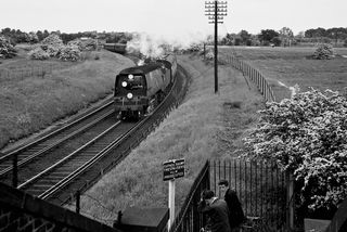 BR(S) Battle of Britain class 34066 'Spitfire' near Mitcham Junction, Greater London with the 9.10am Princes Risborough - Bognor excursion on Sunday 25 May 1958 - C. Hogg [048413]