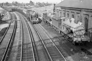 BR(S) Schools class 30911 'Dover' passing Faversham Shed, Kent with the 5.35pm Ramsgate - Victoria service on Monday 18 May 1959 - C. Hogg [048561]