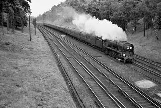 BR(S) West Country class 34042 'Dorchester' at St John’s Woking, Surrey with the 5.30pm Waterloo - Bournemouth service on Saturday 30 Jul 1960 - C. Hogg [048661]