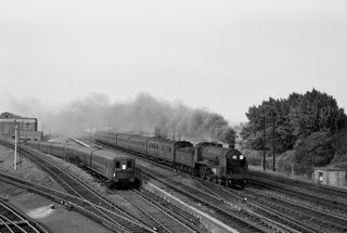 BR(S) H15 class 30521 at Durnsford Road, Wimbledon, Greater London with the 5.54pm Waterloo - Salisbury service on Saturday 06 Aug 1960 - C. Hogg [048665]