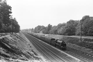 BR(S) King Arthur class 30786 'Sir Lionel' near Woking, Surrey with an up Bournemouth service on Saturday 06 Jul 1957 - C. Hogg [048954]
