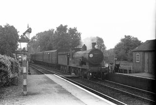 BR(S) T9 class 30117 at Horsebridge, Hampshire with the 3.36pm Andover - Portsmouth service on Saturday 05 Oct 1957 - C. Hogg [048995]