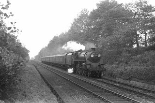 BR Std 4MT class 75070 near Knowle Halt, Hampshire with the 10.55am Bristol - Portsmouth service on Tuesday 22 Oct 1957 - C. Hogg [049000]