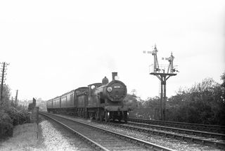 BR(S) T9 class 30726 near Knowle Halt, Hampshire with the 12.42pm Andover - Portsmouth service on Tuesday 22 Oct 1957 - C. Hogg [049001]