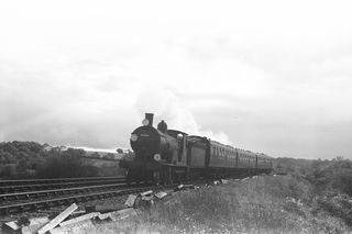 BR(S) T9 class 30284 near Knowle Halt, Hampshire with the 1.42pm Portsmouth - Andover service on Tuesday 22 Oct 1957 - C. Hogg [049002]