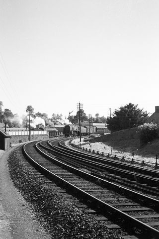 BR(S) S15 class 30499 & BR 9F class 92233 at Templecombe Junction, Somerset on Monday 02 Jul 1962 - A. Postlewaite [051557]