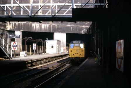 BR(M) Class 31 31219 at King's Cross, Widened Lines Station, Greater London with the 7.29am Hertford North to Moorgate on Monday 14 Jun 1976 - J.J. Smith [060673]
