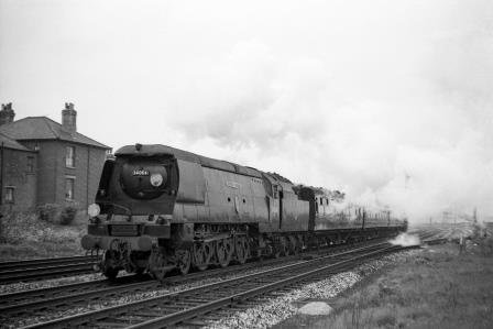 BR(S) Battle of Britain class 34064 'Fighter Command' approaching Millbrook, Hampshire with a Waterloo - Bournemouth service circa May 1962 - J.H.W. Kent [075139]