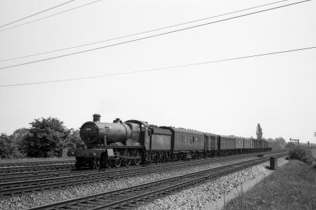 BR(W) Hall class 4919 'Donnington Hall' at Iver, Buckinghamshire with a down Vans service circa 2 Jun 1962 - J.H.W. Kent [075206]