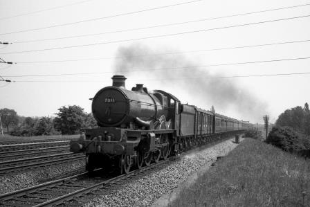 BR(W) Castle class 7011 'Banbury Castle' at Iver, Buckinghamshire with a down Passenger Service circa 2 Jun 1962 - J.H.W. Kent [075207]