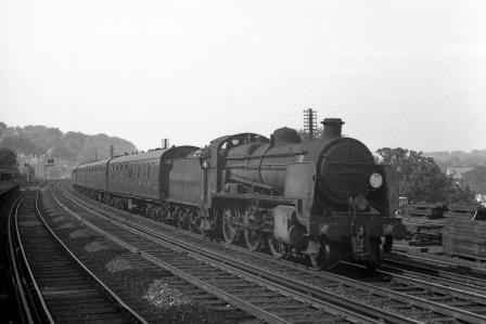BR(S) N class 31825 passing Preston Park Pullman Car Works, East Sussex circa Jul 1962 - J.H.W. Kent [075366]
