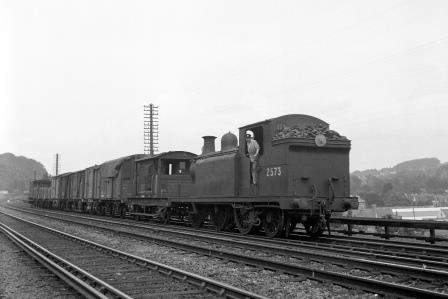 BR(S) E5 class 2573 passing Preston Park Pullman Car Works, East Sussex with a down Goods service on Bank Holiday Monday 04 Aug 1952 - J.H.W. Kent [090410]