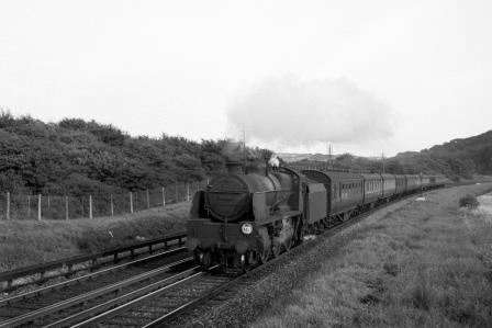 BR(S) U1 class 31902 at Patcham, East Sussex with the 6.28pm Brighton - Southend service on Sunday 17 Aug 1952 - J.H.W. Kent [090432]
