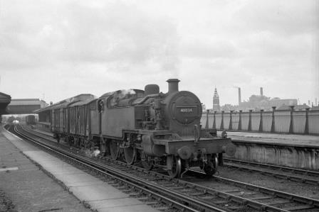 BR(M) 3P class 40034 at Clapham Junction Station, Greater London with a Vans from West London Line on Wednesday 20 Aug 1952 - J.H.W. Kent [090456]