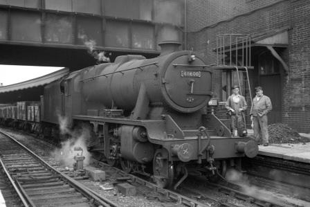BR(M) 8F class 48600 at Clapham Junction Station, Greater London with a LMR - Norwood Goods on Wednesday 20 Aug 1952 - J.H.W. Kent [090463]