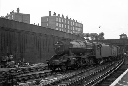 BR(M) 8F class 48146 at Clapham Junction, Greater London with an up Goods service on Wednesday 20 Aug 1952 - J.H.W. Kent [090467]