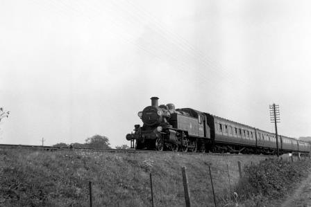 BR(M) 2MT class 41303 at Falmer, East Sussex with an Oxted line - Brighton service on Monday 25 Aug 1952 - J.H.W. Kent [090538]